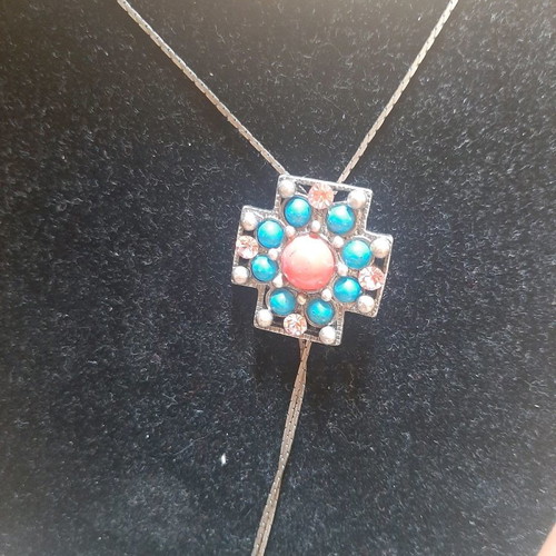 Cross necklace with stones used
