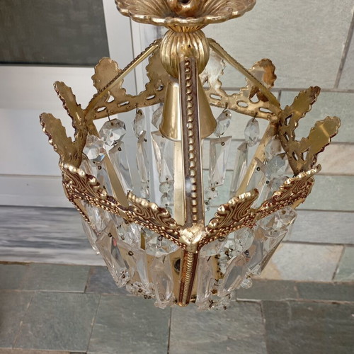 Vintage ceiling light used with brass details