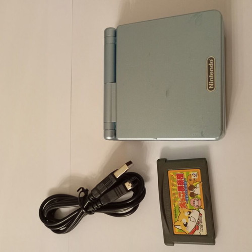 Gameboy Advance SP console with Inukko Club game and USB charger