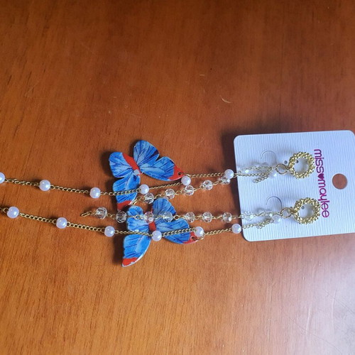 Long earrings new with blue butterfly and gold details