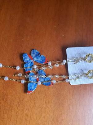 Long earrings new with blue butterfly and gold details