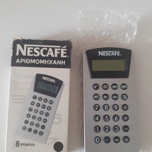 Nescafe Calculator new, may need battery to operate