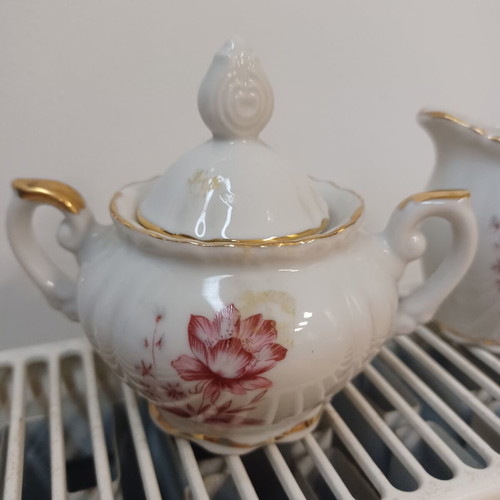 Sugar bowl and creamer used set