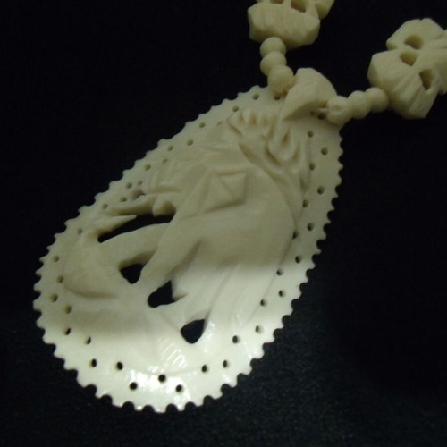 Old jewelry necklace used with white ornaments