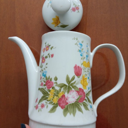Vintage porcelain jug with floral design used, made in GDR