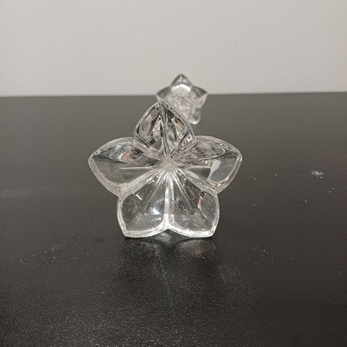 Tall crystal candlestick used with flower shape