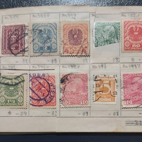 Stamp album used with Austrian stamps, all sealed with hinges