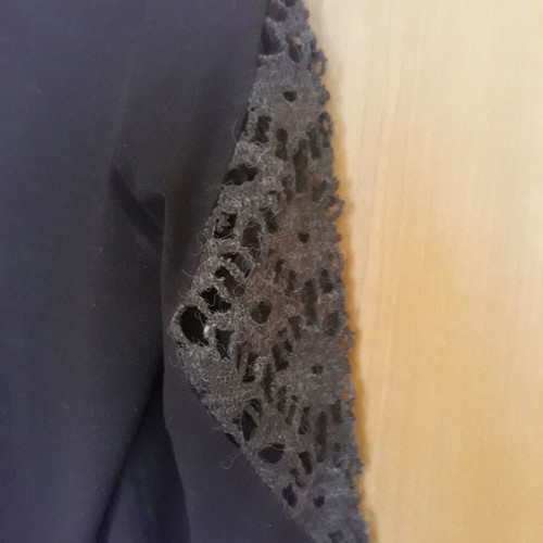 Winter blouse brown used with zigzag and holes on sleeves