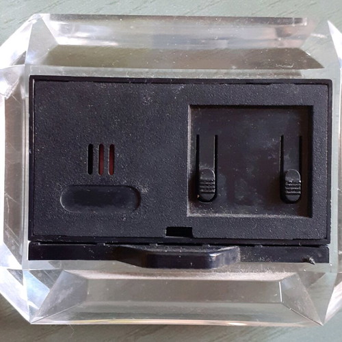 Digital tabletop clock used, plastic