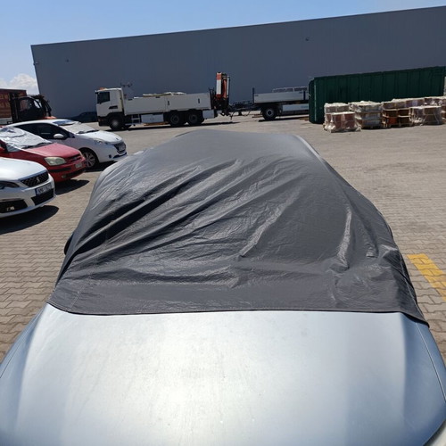 Car Cover Hood like new, waterproof with elastic hooks