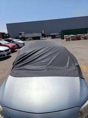 Car Cover Hood like new, waterproof with elastic hooks