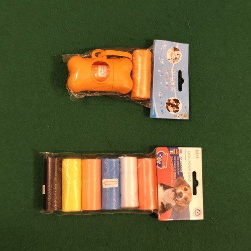 Dog poop bag dispenser set with refill rolls, orange and multicolor