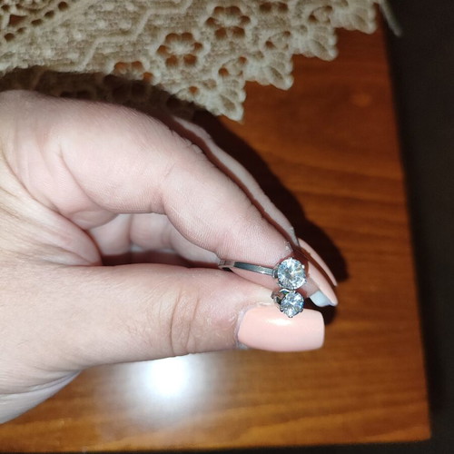 Rings set like new, silver, includes solitaire and two-stone ring size 18.5