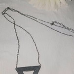 Long necklace with triangle pendant