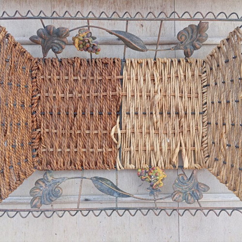 Wicker basket used with metal and decorative grapes