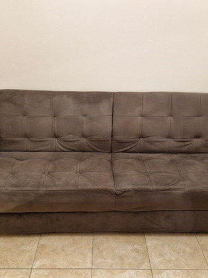 Sofa bed with pouf used, storage space