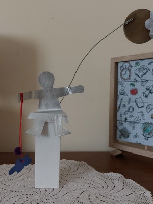 Handmade table sculpture with metal figure and flower, like new