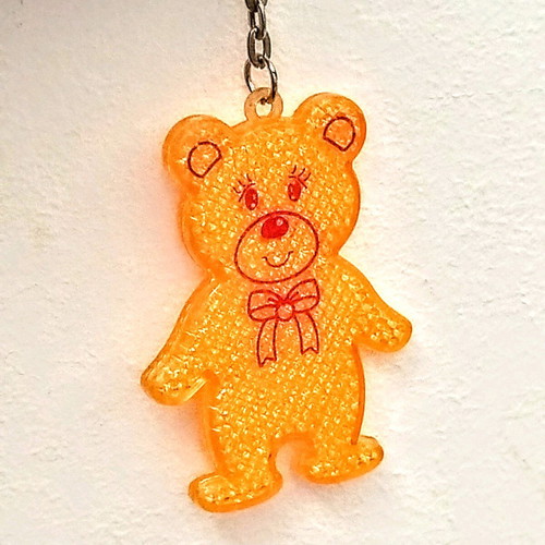 Reflective keychain Bear like new, yellow and orange