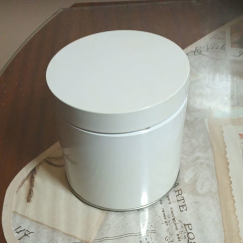 Metal vase with window
