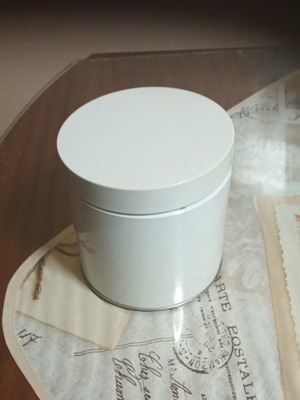 Metal vase with window