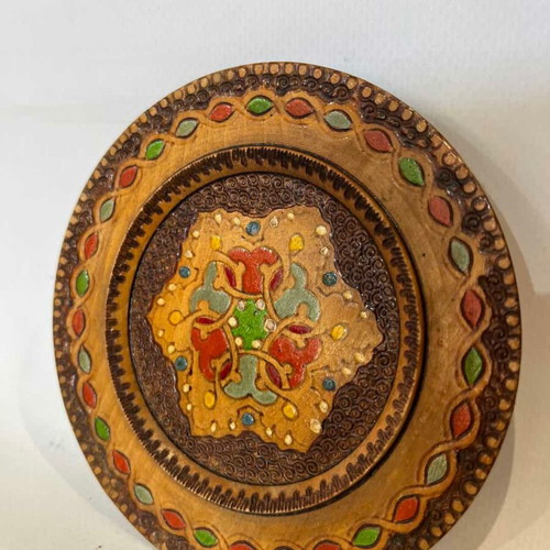 Vintage handmade wooden wall plate with pyrography and folk motif, 12cm