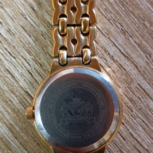 Nina Rossi wristwatch gold like new, women's