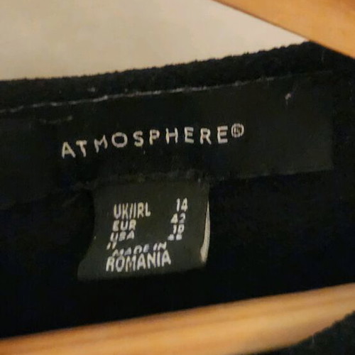 Black Atmosphere shirt like new with bows on the back