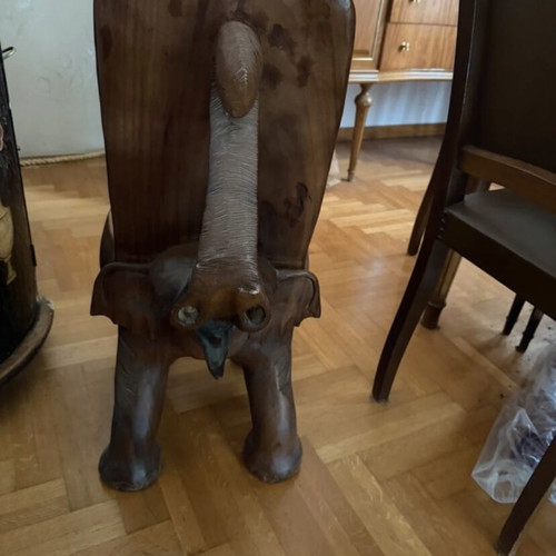 Handmade African chair used with elephant carving