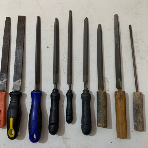 Metal files used, triangular, flat and round