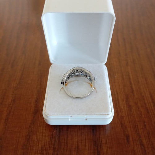 Ring with blue and silver zircon stones, new, size 7