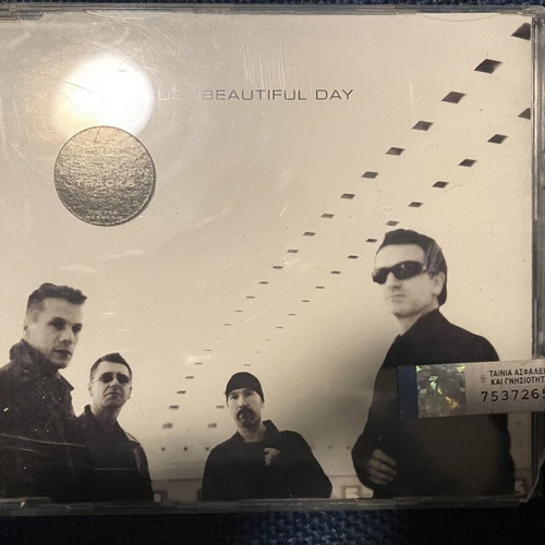 U2 Beautiful Day CD like new, rock