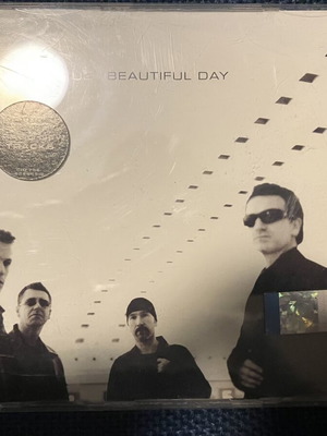 U2 Beautiful Day CD like new, rock