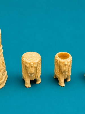 Carved bone elephant figurines set of 4, used, Oriental style