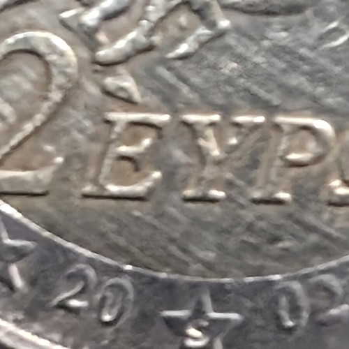 2 Euro 2002 Greece coin with 4 minting errors