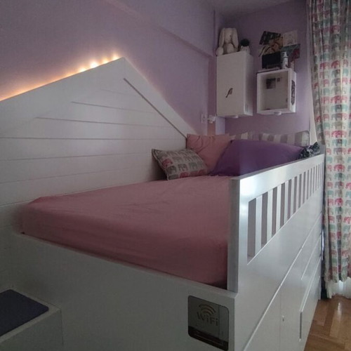 Bed with storage space, lacquered wood