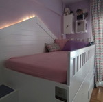 Bed with storage space, lacquered wood