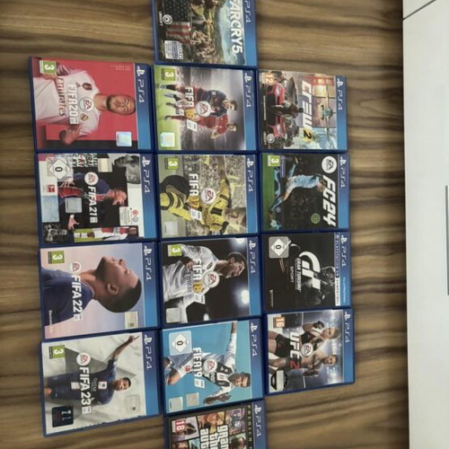 PlayStation 4 (PS4) like new with 14 games