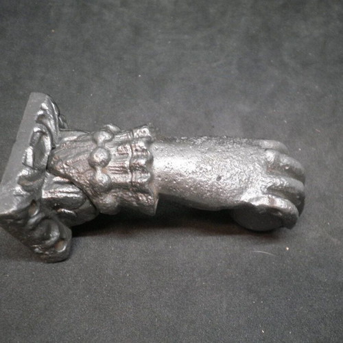 Antique iron door knocker used, made of cast iron