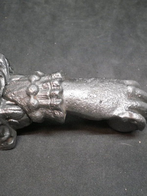 Antique iron door knocker used, made of cast iron