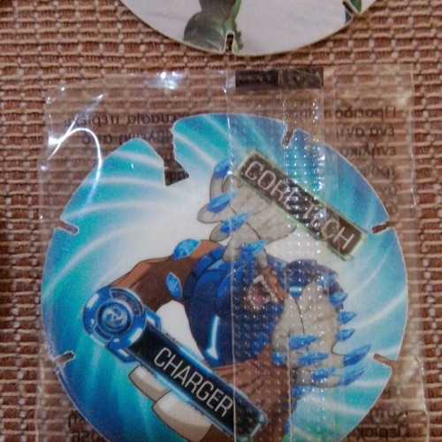 Cheetos Monsuno and Transformers collectible caps, pack of 7, new