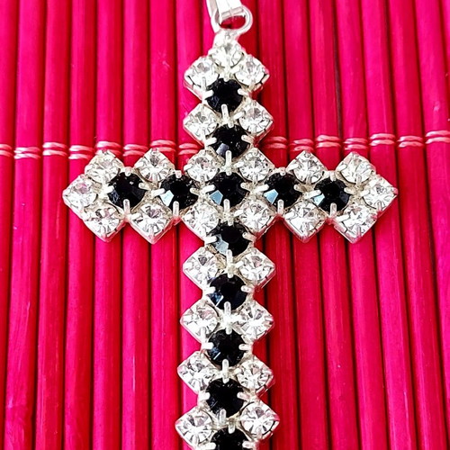 Cross used with white and black rhinestones