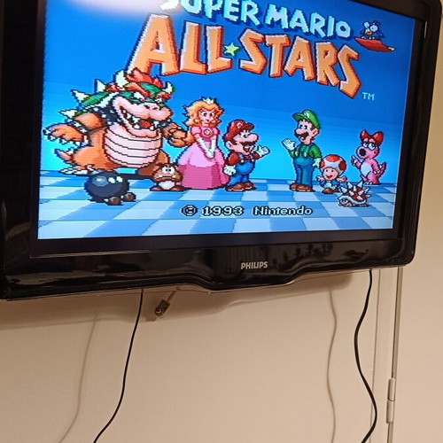 Super Nintendo 1992 like new with one controller and Super Mario game