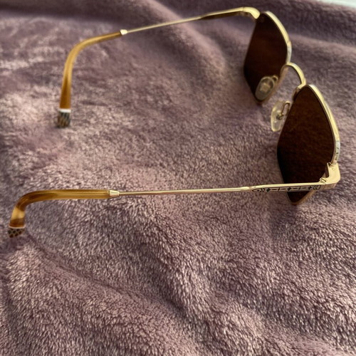 Gigi Hadid sunglasses authentic new gold with case and cloth
