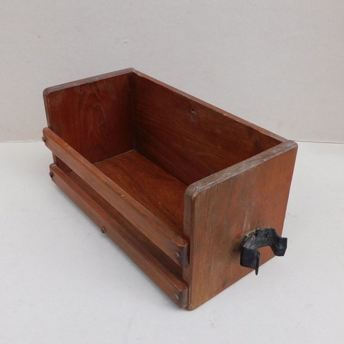 Wooden shelf made of pine, originally installed on a recreational boat