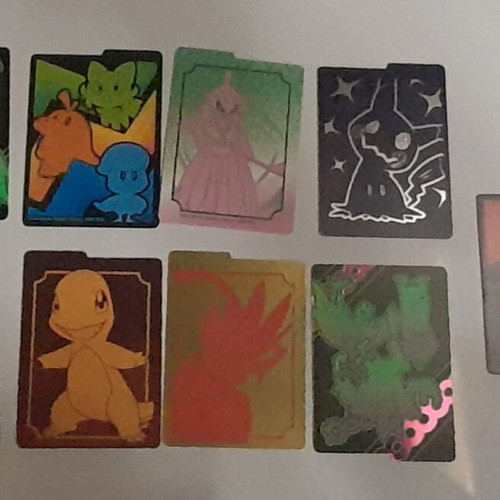 Pokémon lot used with 53 cards, 65 energy cards and 62 sleeves
