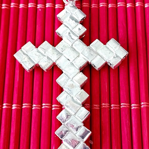 Cross used with white and black rhinestones