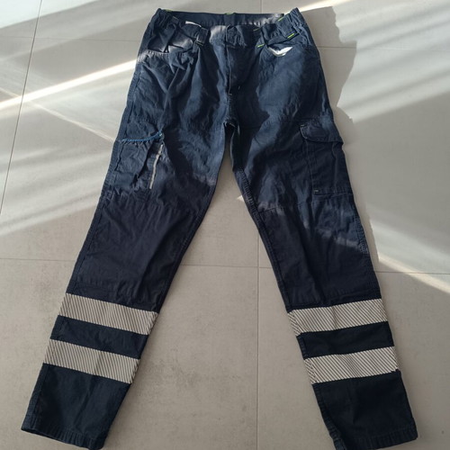 Work pants with reflective stripes