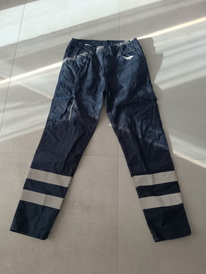 Work pants with reflective stripes
