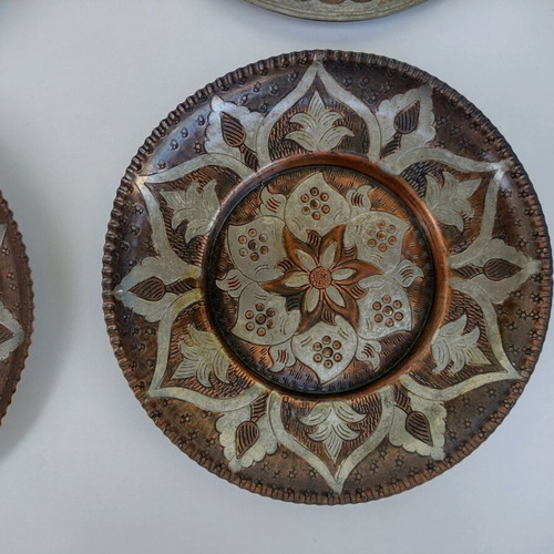 Copper Greek handmade carved wall plates used, all together