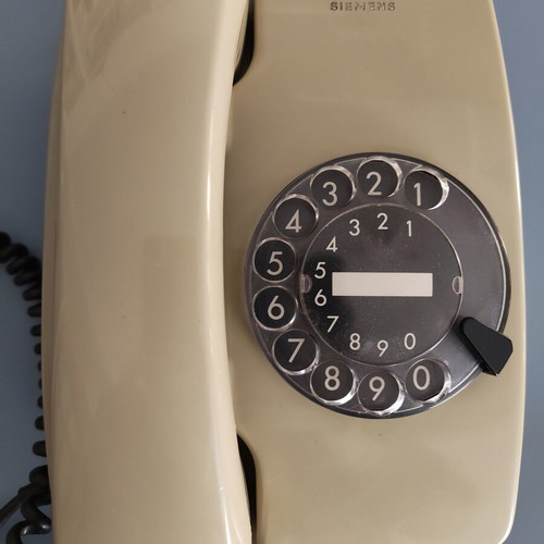 Siemens vintage telephone with rotary dial used